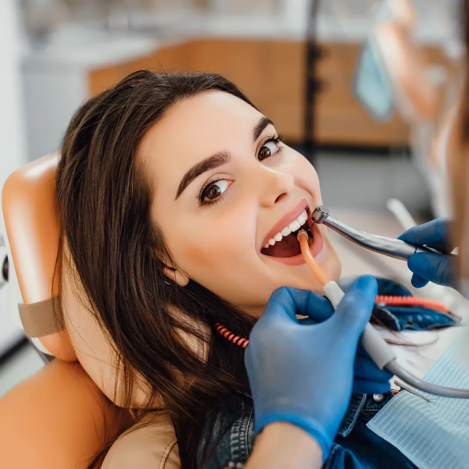 Smiling patient after dental care at our Sainte-Julie clinic